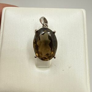 NWOT 10x14mm oval cut, faceted smoky quartz pendant in sterling silver!